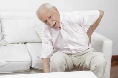 elderly man with back problems