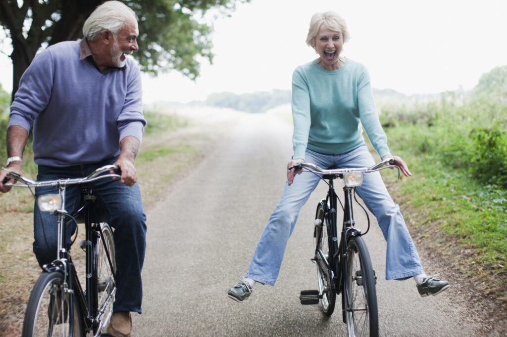 Happy Older Couple on Bicycles